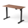 OmniGO regulējama augstuma galds, riekstkoka galda virsma 120 × 60 cm, melns rāmis